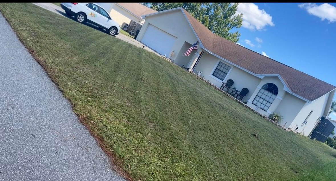 Professional lawn mowing by Pinellas Lawn Care — veteran owned